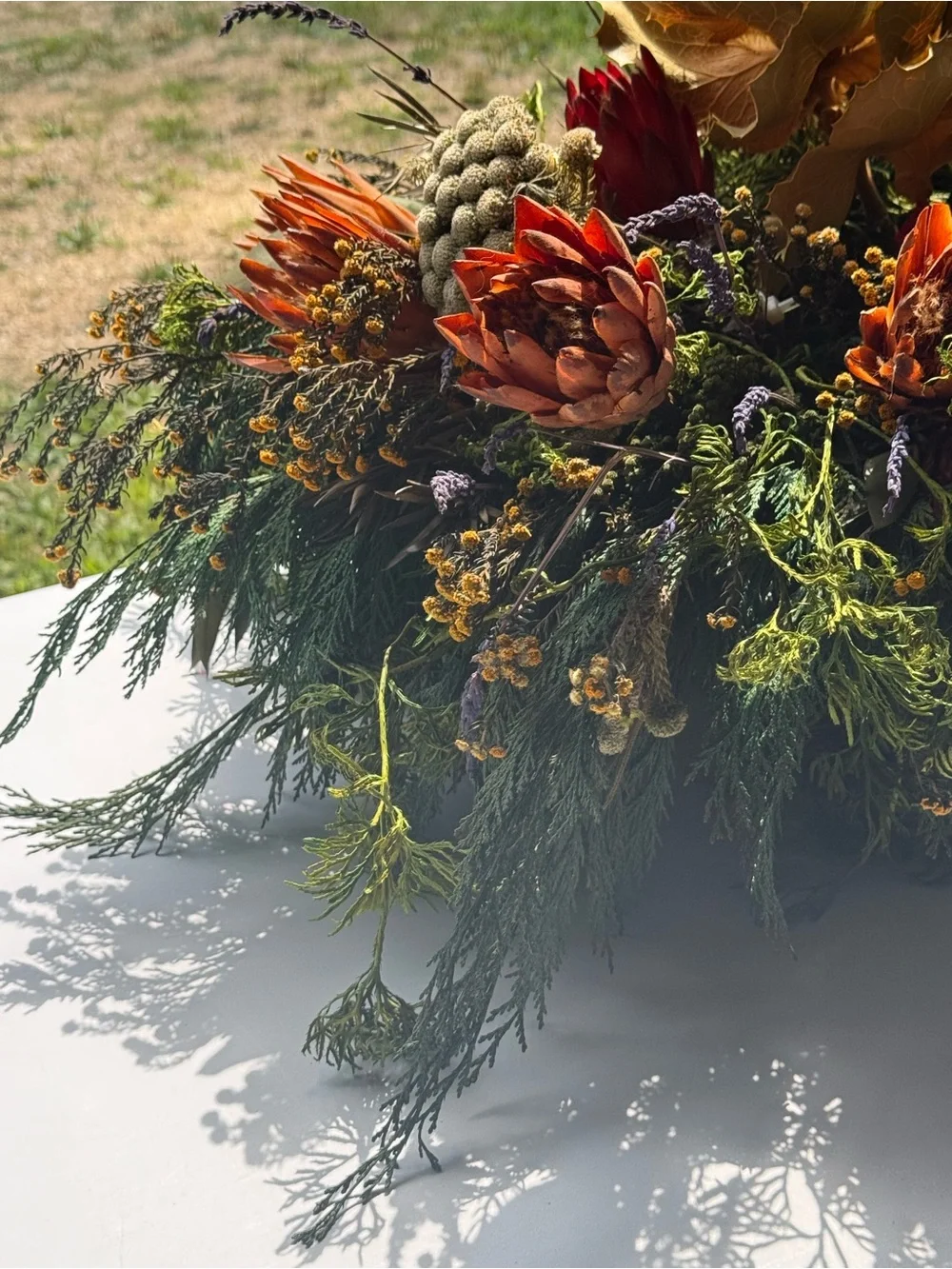 Autumn table center piece or decoration floral leaves full in planter box